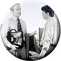 Image of two men talking