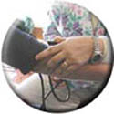 Image of nurse taking blood pressure