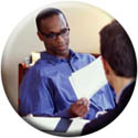 Image of two men talking