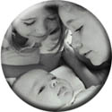 Image of children lookinga t baby